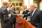 John Morgan, main backer of the medical-marijuana amendment, right, shakes hands with campaign manager Ben Pollara after court arguments Thursday. Jon Mills, left, argued the pro-amendment case. Photo by Bill Cotterell.