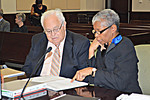 Leon County Judge Judith Hawkins goes over documents with her attorney, former Supreme Court Justice Gerald Kogan, at the start of Judicial Qualification Commission hearings on her case Monday. Photo by Bill Cotterell.