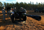 A gun crew begins to inspect their M119A2 howitzer at Camp Blanding. Florida officials worry about development encroaching on military bases in the state. Photo from U.S. Army