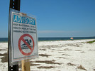 A sign at a Franklin County beach in 2005 advises visitors against swimming because of high bacteria levels. File photo by Bruce Ritchie.