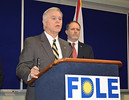 FDLE Commissioner Gerald Bailey announces Saturday that an FDLE chemist in Pensacola has been placed on leave pending a review of about 2,600 drug cases he handled. Photo by Bill Cotterell.