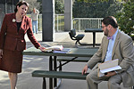 Florida Commission on Ethics attorney Diane Guillemette and Juan-Carlos Planos, a lawyer for state Rep. Erik Fresen, negotiate outside the commission's meeting Friday. Photo by Bill Cotterell.