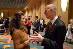 Gov. Rick Scott talks with Cynthia Henderson, president of the Florida Federation of Republican Women, at the state Republican Party annual meeting Saturday in Orlando. Photo by Bill Cotterell.