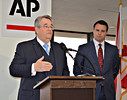 Senate President Don Gaetz  discusses the Weatherford-Gaetz Work Plan 2014 on  Wednesday at the annual AP pre-legislative session meeting while House Speaker Will Weatherford listens. Photo by Bill Cotterell.