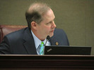 Sen. Wilton Simpson explains his amendment to SB 1582 dealing with petroleum contamination sites. It allows station owners to hire their own contractors if it reduces the cost to the state by 25 percent. Photo by Bruce Ritchie.