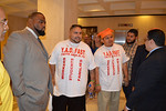 Sen. Dwight Bullard and Rep. Ricardo Rangel talk with protestors in the Capitol's fourth-floor lobby on Tuesday after the Senate revived the in-state tuition bill. Photo by Bill Cotterell.