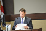 House Speaker Will Weatherford goes through a deposition during a trial challenging the drawing of Florida's 27 congressional districts. Plaintiffs argue the redistricting violated a constitutional amendment forbidding favoritism. AP photo-Bill Cotte