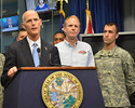 Gov. Rick Scott discusses storm preparations at the state Emergency Operations Center on Friday, along with Bryan Koon, director of the Division of Emergency Management, center, and National Guard Maj. Blake Heidelberg, right. Photo by Bill Cotterell
