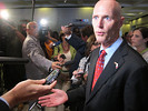 Gov. Rick Scott discusses the Internet cafe legislation with reporters in the Capitol rotunda, shortly after he signed the measure (HB 155) into law. Photo by Bill Cotterell.