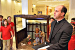 The Rev. John Cayer, rector of the Co-Cathedral of St. Thomas More in Tallahassee, speaks Tuesday at a celebration of the Nativity scene built in the rotunda of Florida's Capitol. Photo by Bill Cotterell.