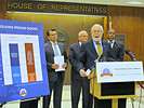 Barney Bishop, head of the Florida Smart Justice Alliance, front, talks about prison legislation Tuesday at a news conference with Sen. Thad Altman, left, and Reps. Dennis Baxley and Darryl Rouson  in front of the House chamber. Photo by Bill Cottere